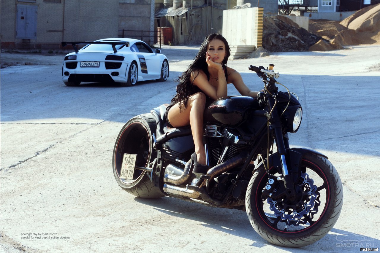 Sexy model Brunettes on a motorcycle in Krasnoyarsk